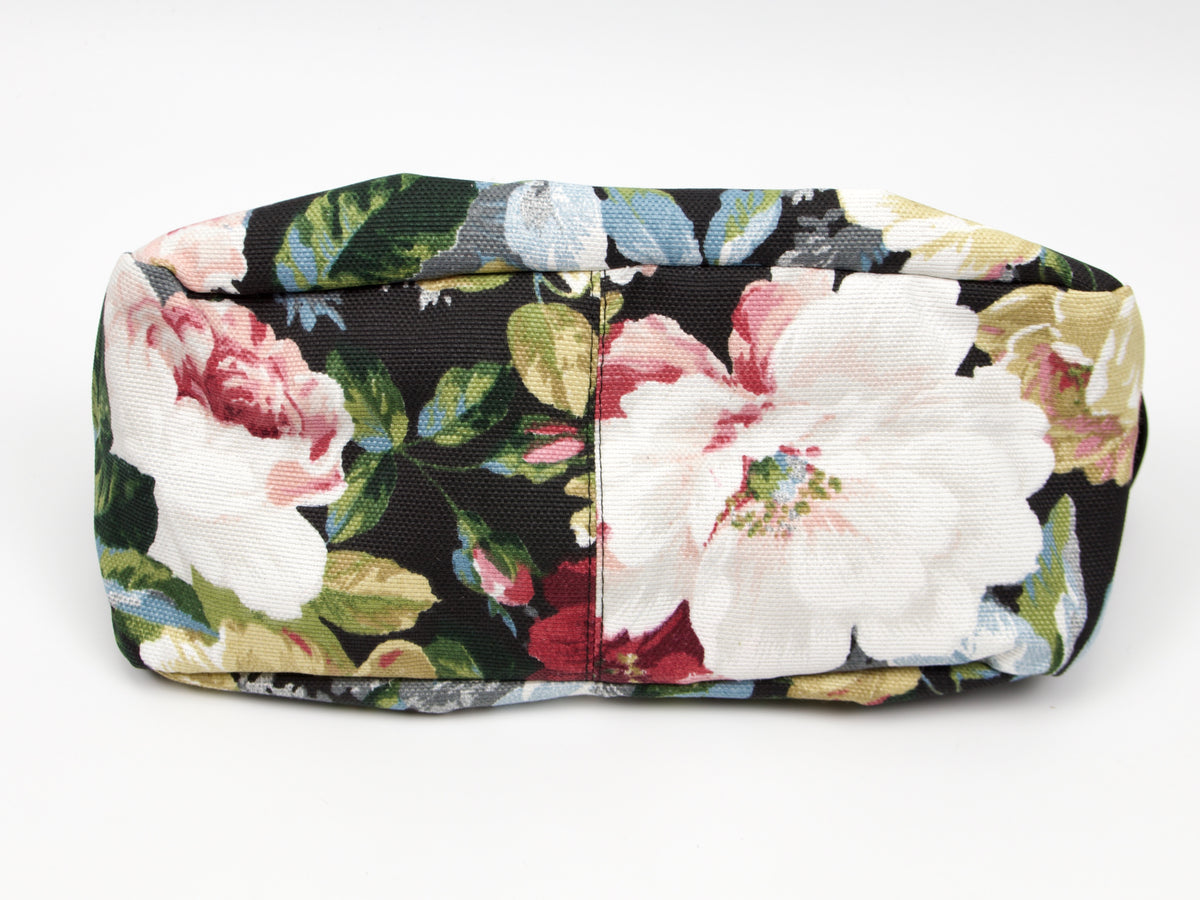 Bolsa de accesorios Milloo Estia de lona con estampado floral oscuro
