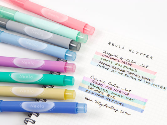 Set of Neola glitter markers with color names listed on a white background