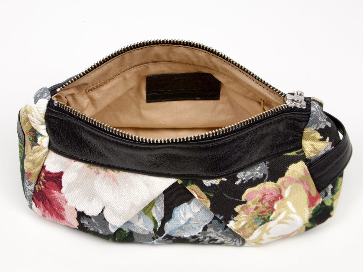 Bolsa de accesorios Milloo Estia de lona con estampado floral oscuro